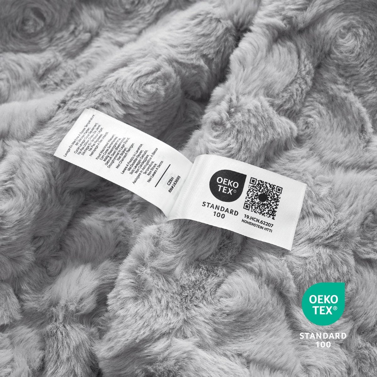 OEKO-TEX STANDARD 100 certified faux fur blanket texture close-up #color_Grey